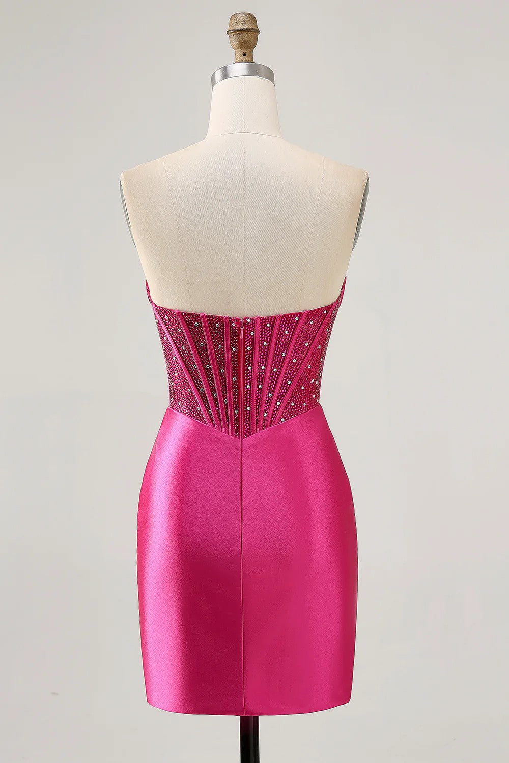 Vestido de fiesta corto ajustado con corsé fucsia sin tirantes brillante