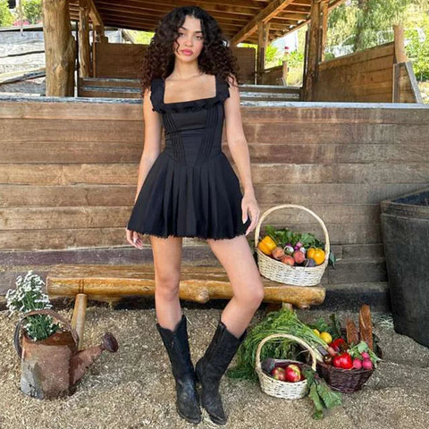 Vestido de vacaciones negro con volantes en forma de A