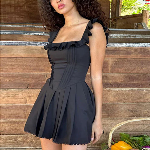 Vestido de vacaciones negro con volantes en forma de A