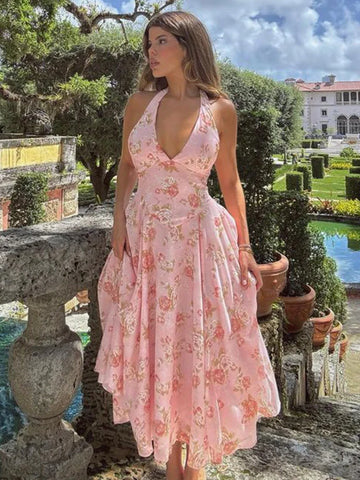 Vestido vacacional de corte A con cintura cruzada y estampado floral