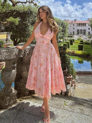 Vestido vacacional de corte A con cintura cruzada y estampado floral