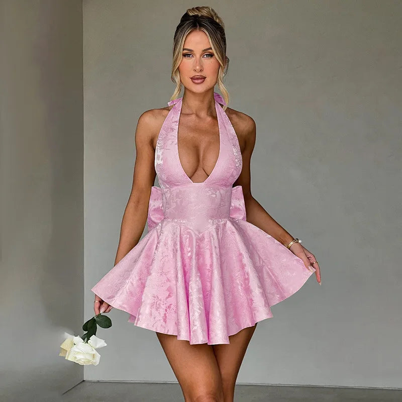 Vestido de vacaciones cruzado con lazo en la cintura de Jacquard