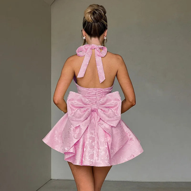Vestido de vacaciones cruzado con lazo en la cintura de Jacquard