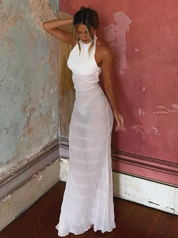 Vestido de vacaciones con espalda descubierta y perspectiva