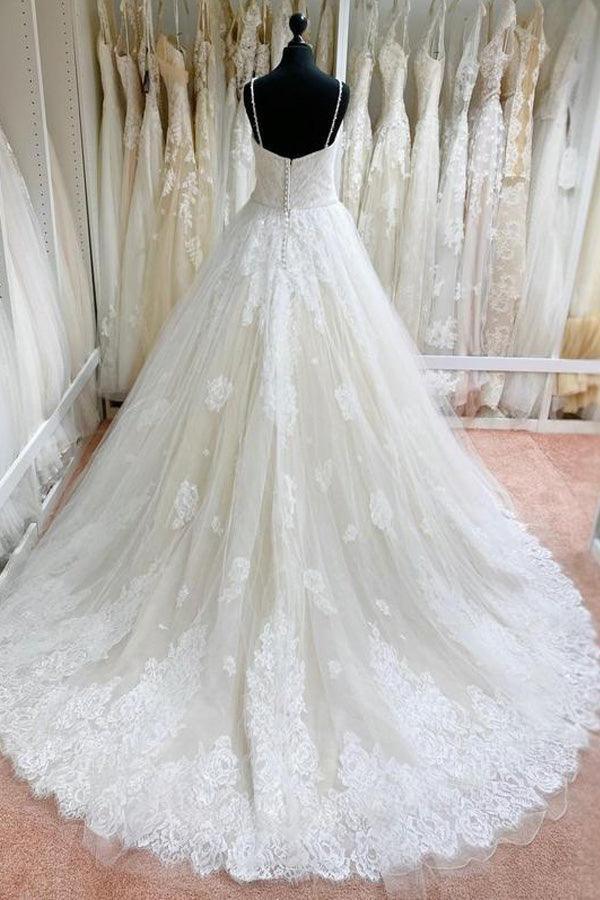 Vestidos de novia con tirantes finos, apliques y encaje de tul