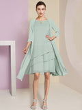 Vestidos de madre de la novia de corte A/princesa con escote joya y largo hasta la rodilla 