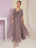 Vestidos de madre de la novia de corte A/princesa, escote en V y largo hasta la rodilla 