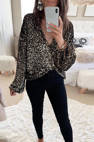 Top cruzado con lentejuelas y escote en V profundo de Meridress
