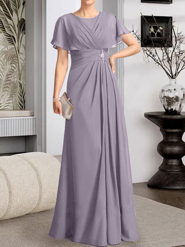 A-Linien-Kleid aus Chiffon mit Rundhalsausschnitt und bodenlanger Verarbeitung, verziert mit plissierten Perlen.