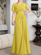 A-Linien-Kleid aus Chiffon mit Rundhalsausschnitt und bodenlanger Verarbeitung, verziert mit plissierten Perlen.