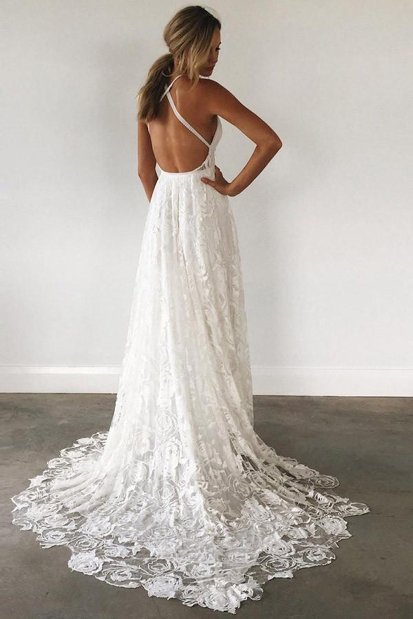 Vestido de novia de encaje de corte A con tirantes, espalda descubierta y cola capilla