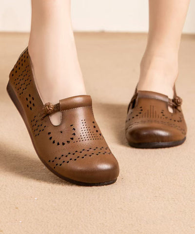 Zapatos planos negros retro de piel de vaca con agujeros 