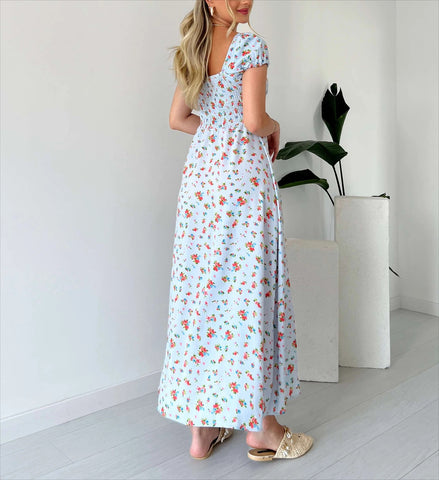 Vestido midi fruncido con estampado floral 