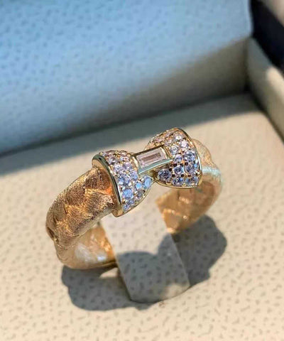 Schicke vergoldete Ringe aus Sterlingsilber mit eingelegtem Zirkonia und Schleife 