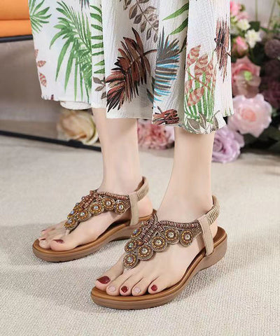 Sandalias planas de cuña con circonitas negras y diseño bohemio 