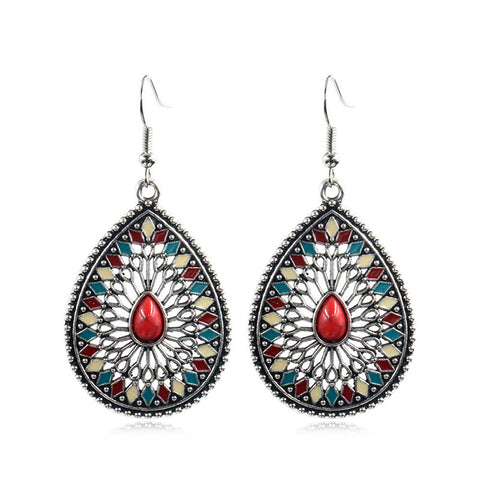 Pendientes de flores recortadas redondas de moda 