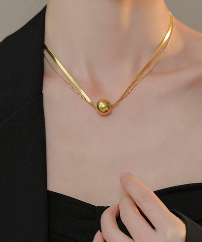 Collar con colgante de bola de acero inoxidable dorado para mujer 