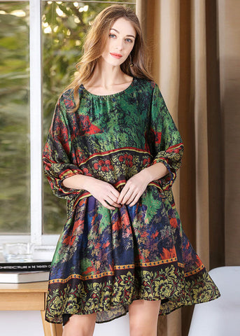 Edles grünes Oversize-Kleid aus mittellanger Seide mit Batikmuster und Laternenärmeln 