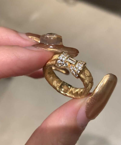Schicke vergoldete Ringe aus Sterlingsilber mit eingelegtem Zirkonia und Schleife 