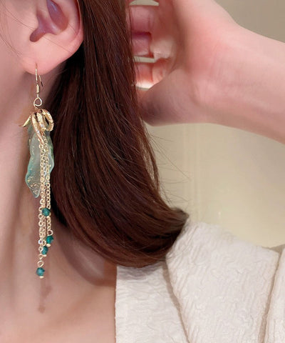 Pendientes colgantes con borlas de cristal acrílico de aleación asimétrica verde claro de moda 