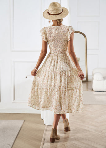 Vestido midi plisado elástico con mangas de loto y cuello redondo floral 