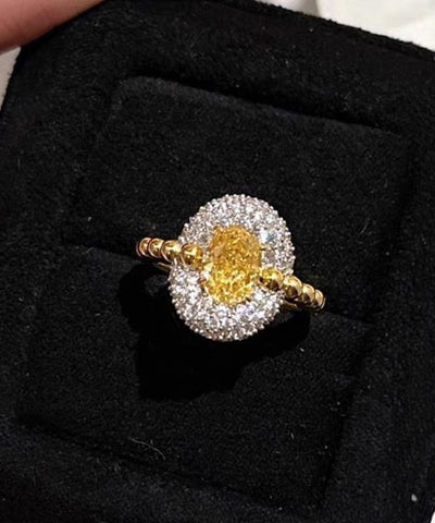 Anillos elegantes con forma de huevo de circonita dorada y cobre blanco 
