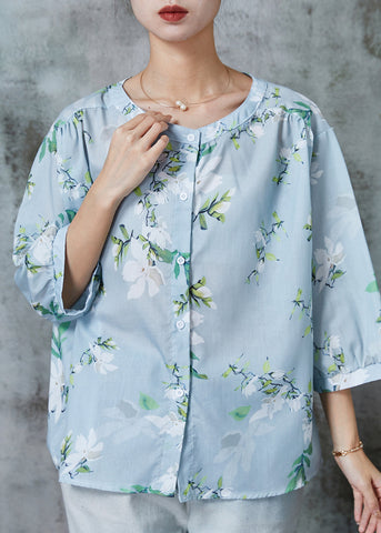 Blusa de algodón con estampado extragrande en azul claro y mangas tipo pulsera 