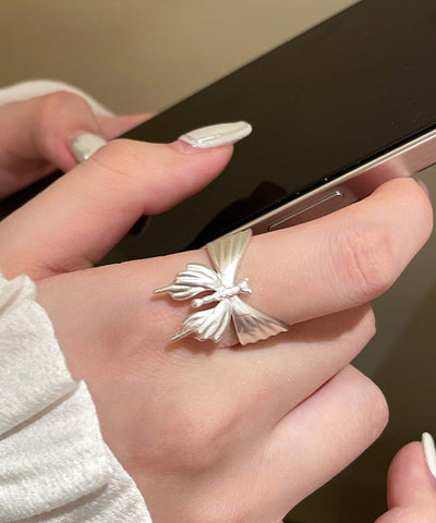 Anillos de apertura de mariposa de cobre y seda fina 