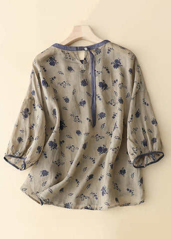 Camiseta holgada de algodón con botones y estampado caqui, mangas con pulsera 