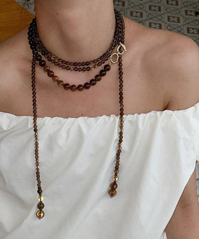 Collar de cuentas doradas de cobre y chocolate para mujer 