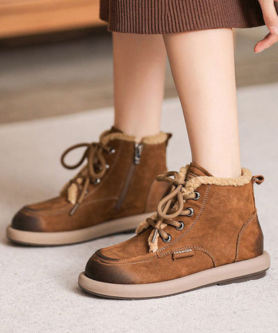 Botas marrones de piel de vaca con cordones y forro de lana afelpada 