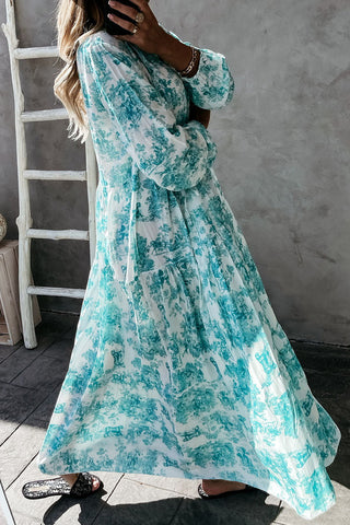 Vestido largo de manga larga con cuello en V y estampado floral 