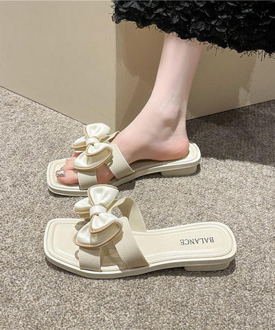 Sandalias verdes elegantes con lazo y punta abierta 