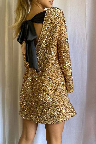 Vestido mini holgado con lazo en la espalda y lentejuelas para bailar toda la noche 