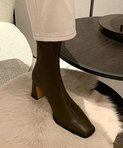 Botas francesas de piel de vacuno negra con tacón grueso y entretejido 