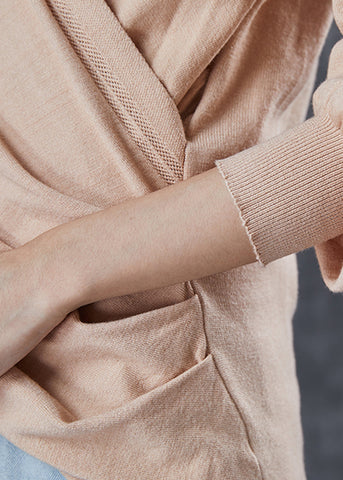 Tops de punto asimétricos beige ajustados con conexión cruzada primavera 