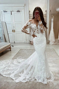 Hermoso vestido de novia largo de sirena con mangas largas y encaje y escote en V.