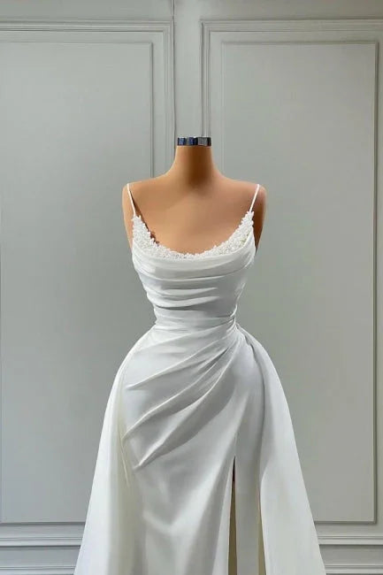 Wunderschöne lange A-Linien-Hochzeitskleider mit Spaghettiträgern und Perlen