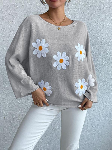 Suéter suelto con mangas de murciélago y bordado floral 