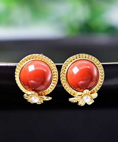Pendientes de plata de ley roja con ágata dorada y perla. 