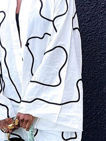 Blusas y camisas de manga larga sueltas con botones y estampados con solapa 