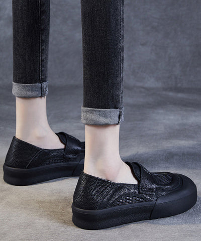 Mocasines casuales de piel de vaca negra con agujeros para mujer 