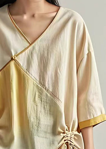 Brazalete de lino con patchwork y cordones en beige 