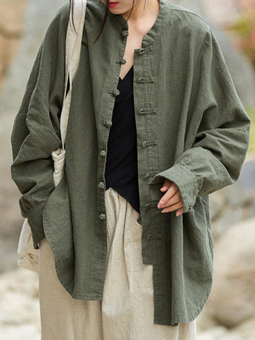 Blusas plisadas de color liso con cuello alto, mangas murciélago y botones de rana chinos sueltos. 