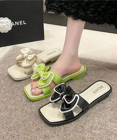 Sandalias verdes elegantes con lazo y punta abierta 