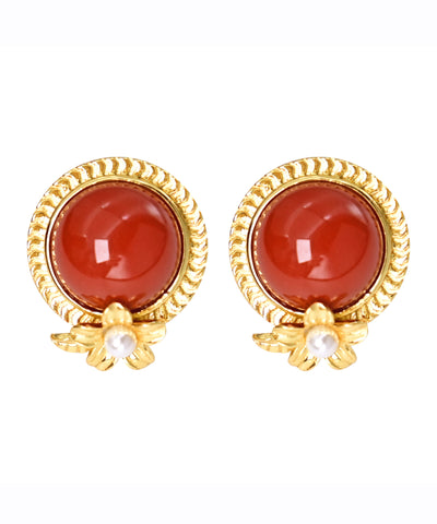 Pendientes de plata de ley roja con ágata dorada y perla. 