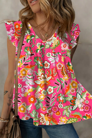 Top de tirantes con cuello en V y volantes florales en color rosa 