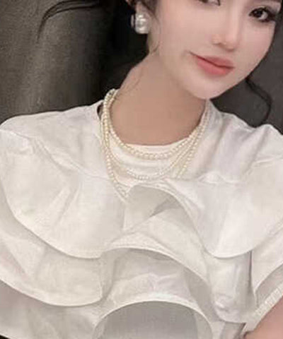 Collar elegante con borlas y cuentas de patchwork de perlas blancas 