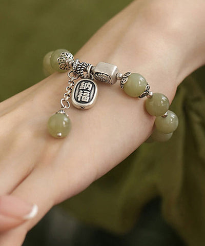 Conjunto de dos piezas de pulsera y anillos con dijes de jade en plata esterlina verde claro de Boutique 