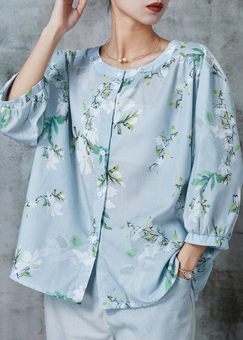 Blusa de algodón con estampado extragrande en azul claro y mangas tipo pulsera 